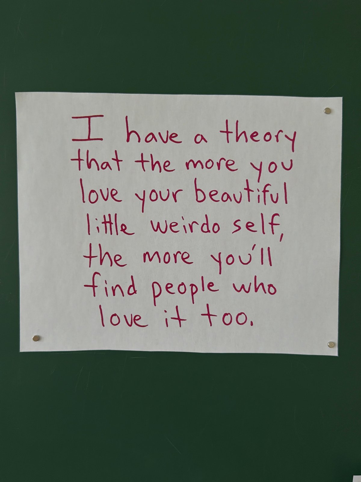 Inspirational message board with flowers documented by witness