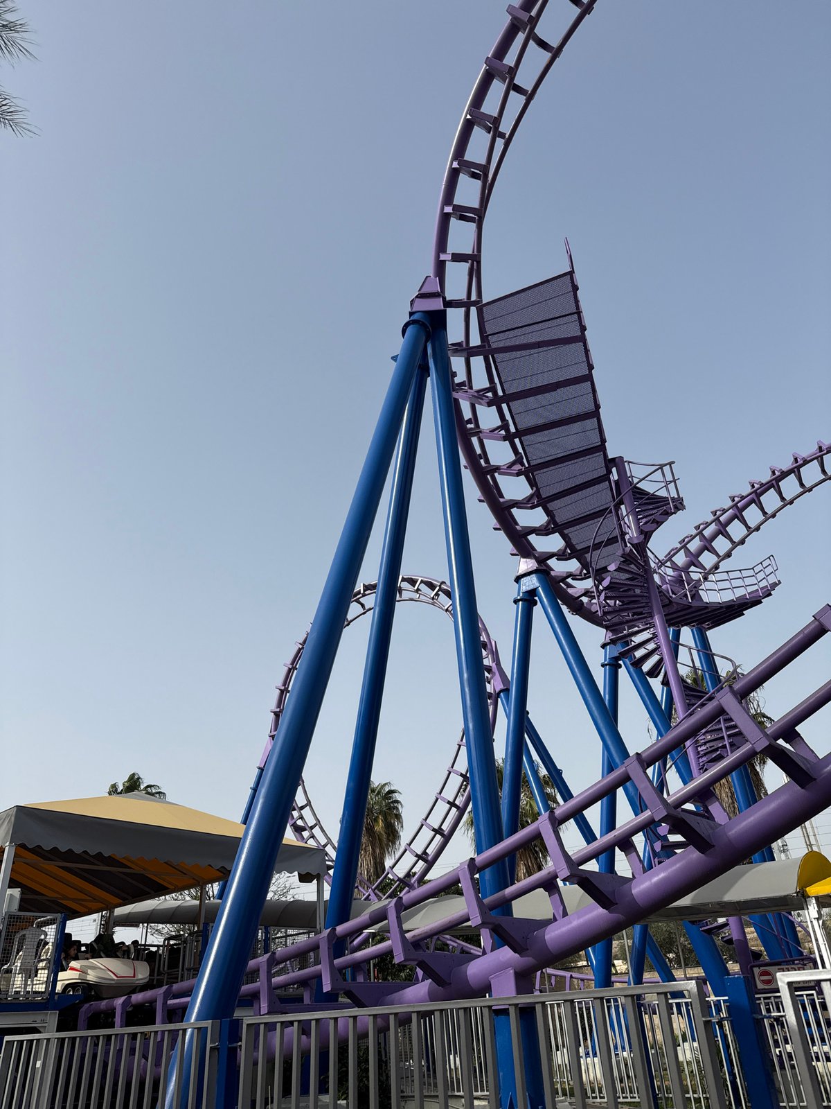 Tel Aviv amusement park with purple roller coaster observed