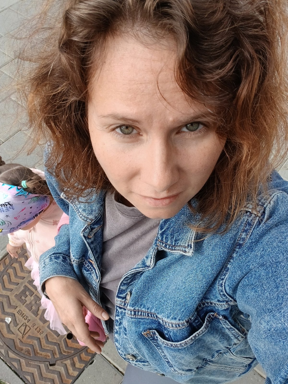 Selfies and street life near a Yekaterinburg apartment block