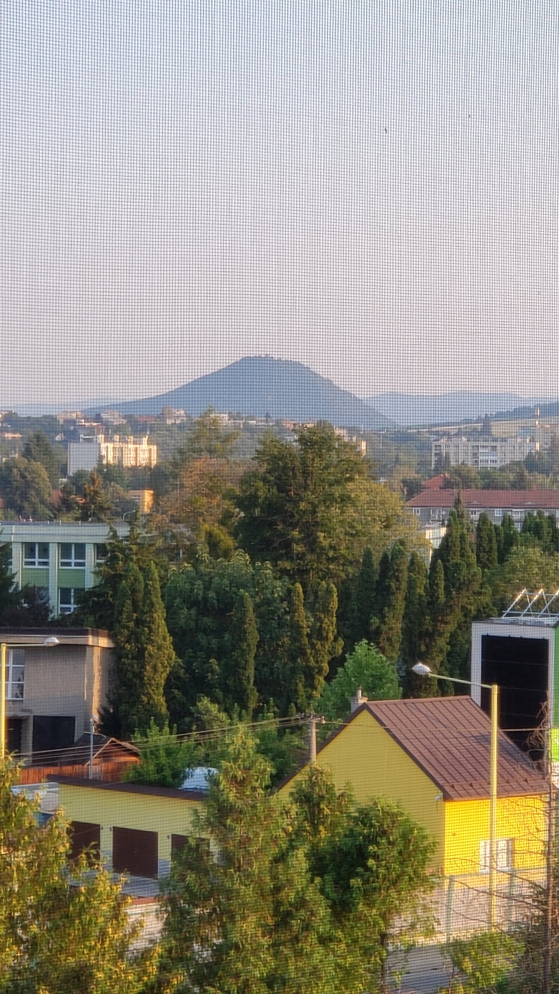 Rooftop views across Prešov neighborhoods at dawn