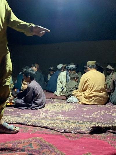 Community meal gathering observed in Dehkheshk, Afghanistan