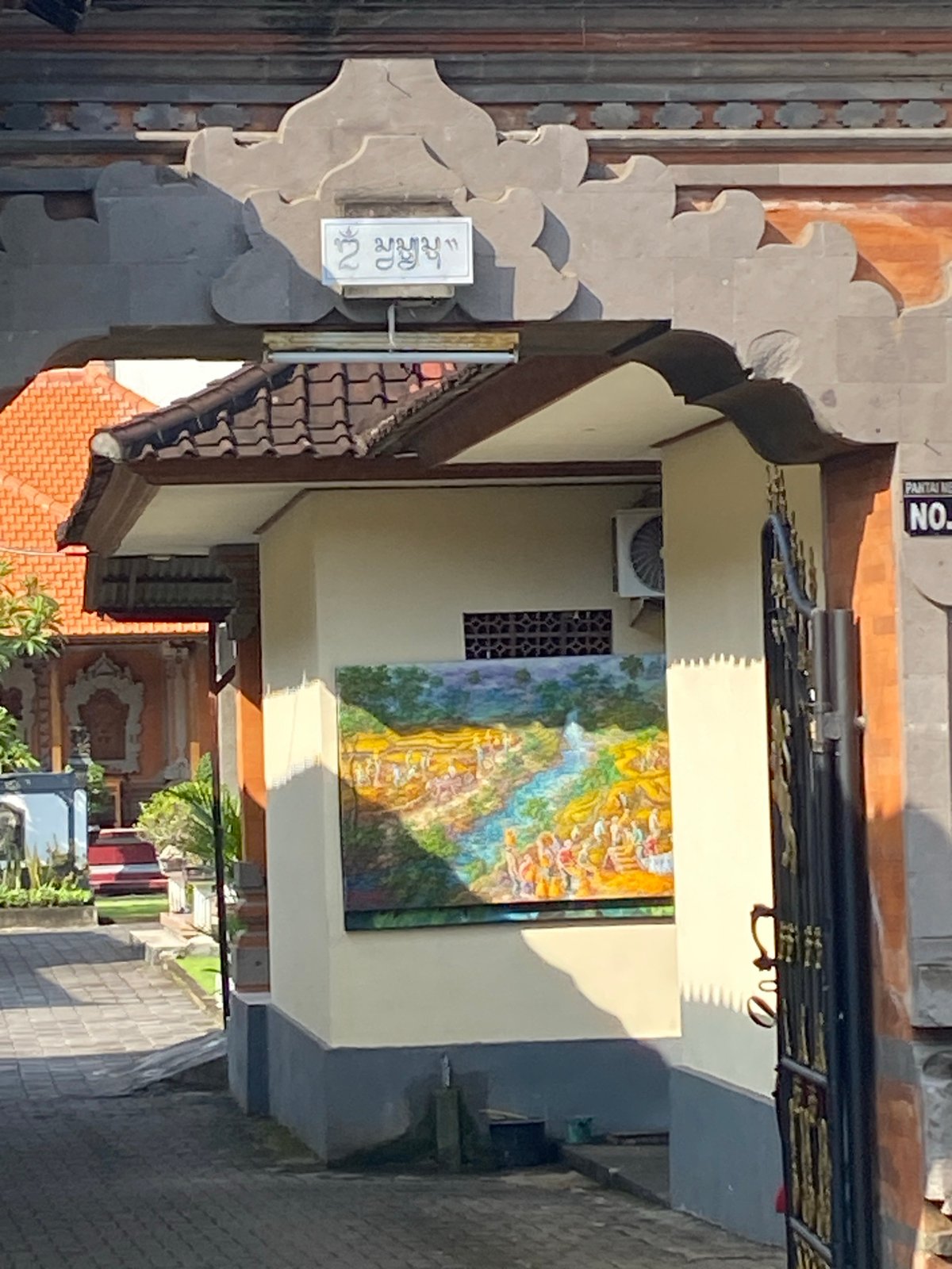 Tourist browsing Balinese crafts and culture in Nusa Dua