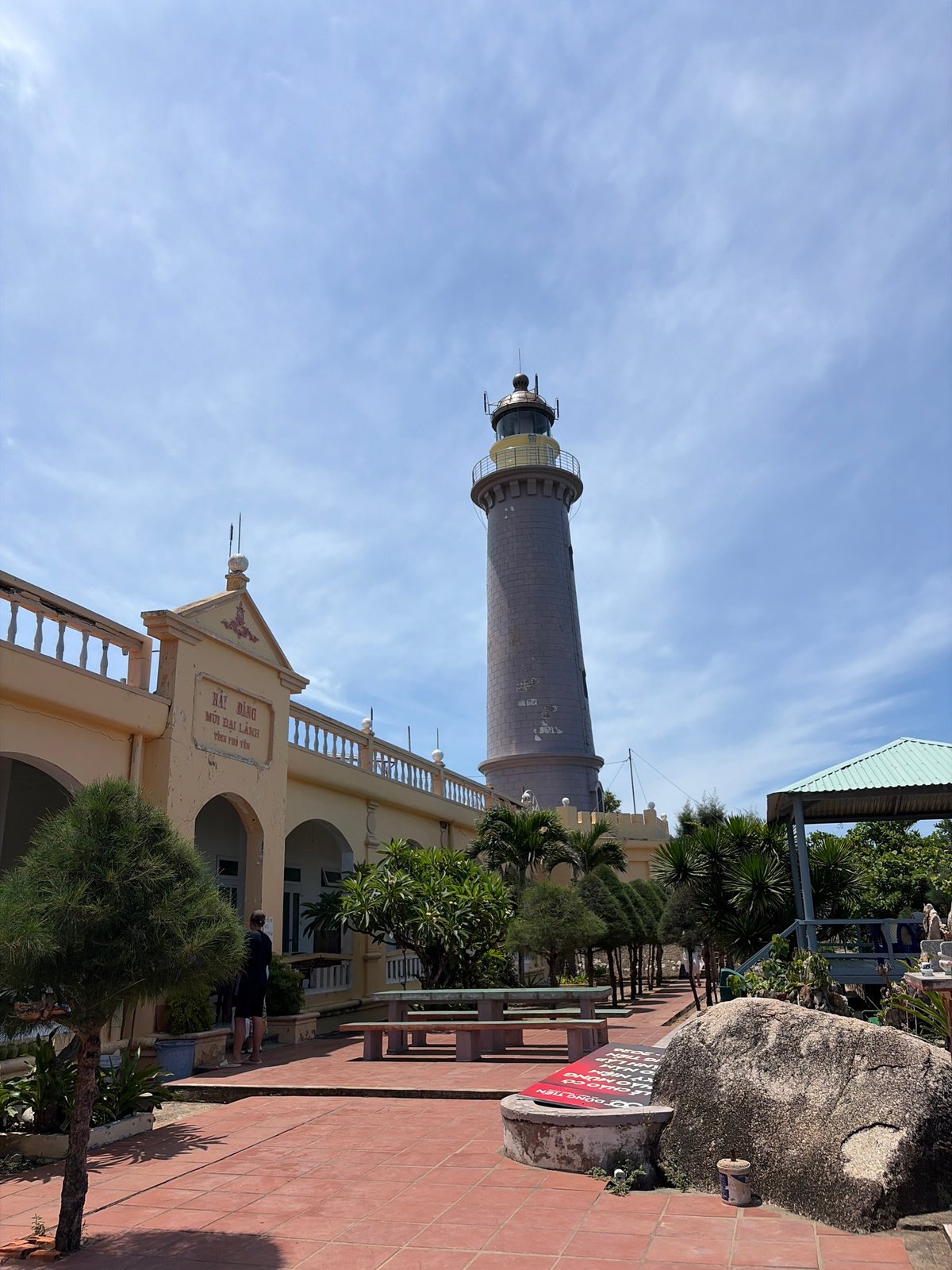 Coastal Vietnamese headland with lighthouse, beach views, and outdoor gym