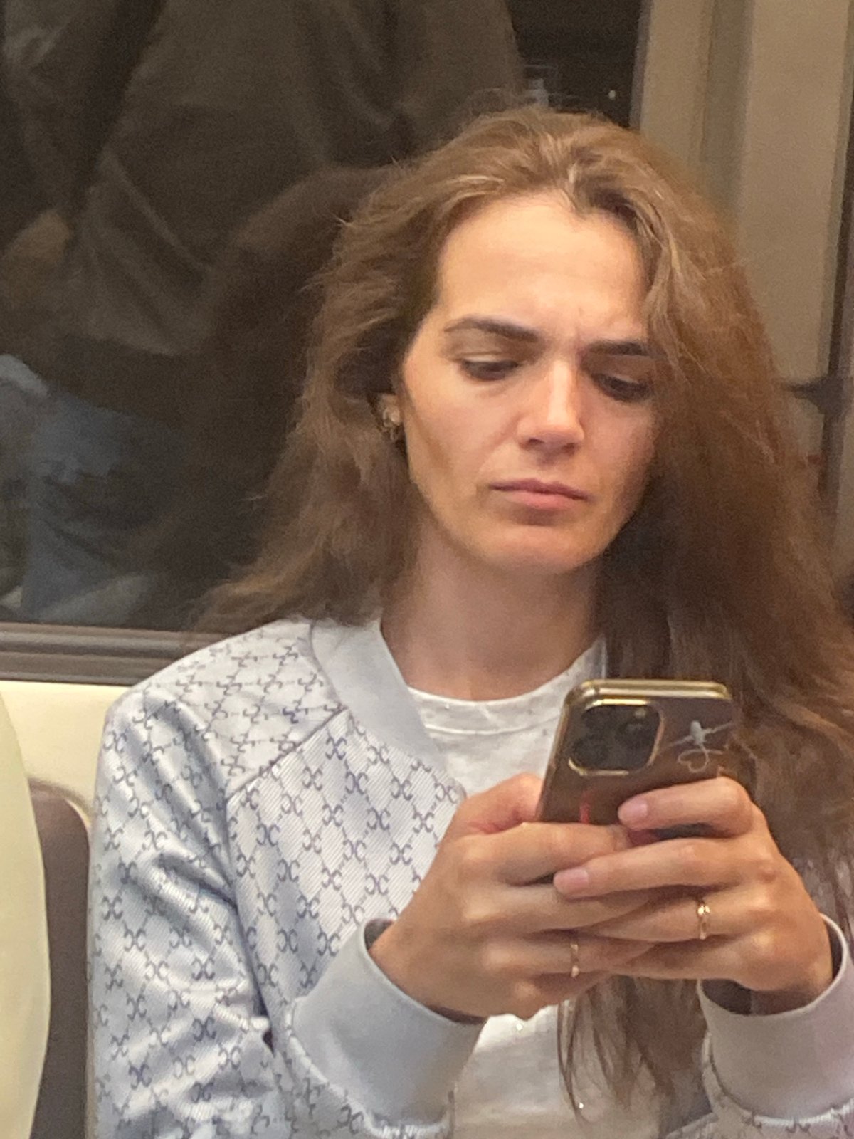 Evening scenes inside the Moscow Metro: passengers, tunnels, and bronze statues