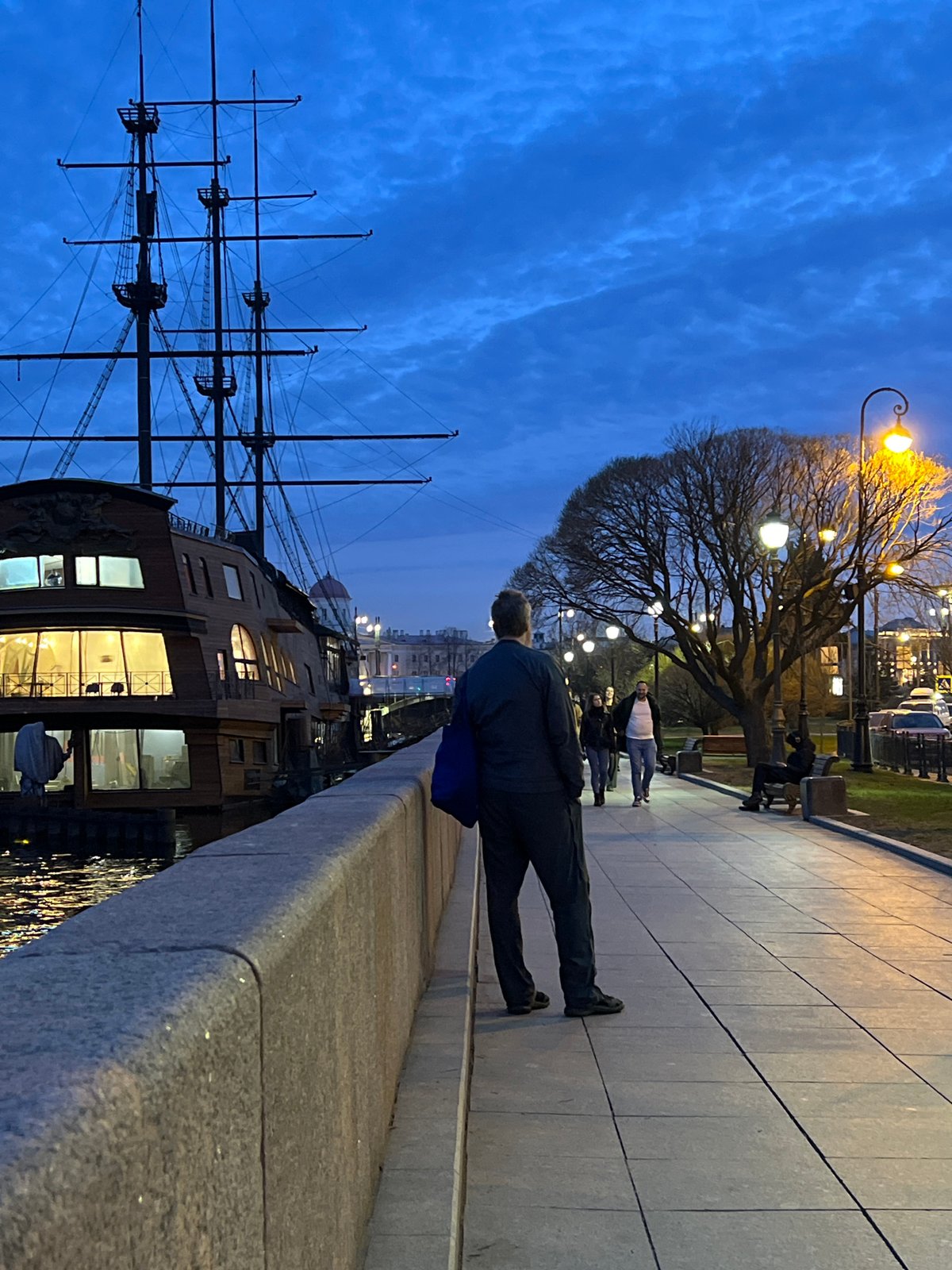 Evening snapshots capture daily life across Saint Petersburg canals and streets