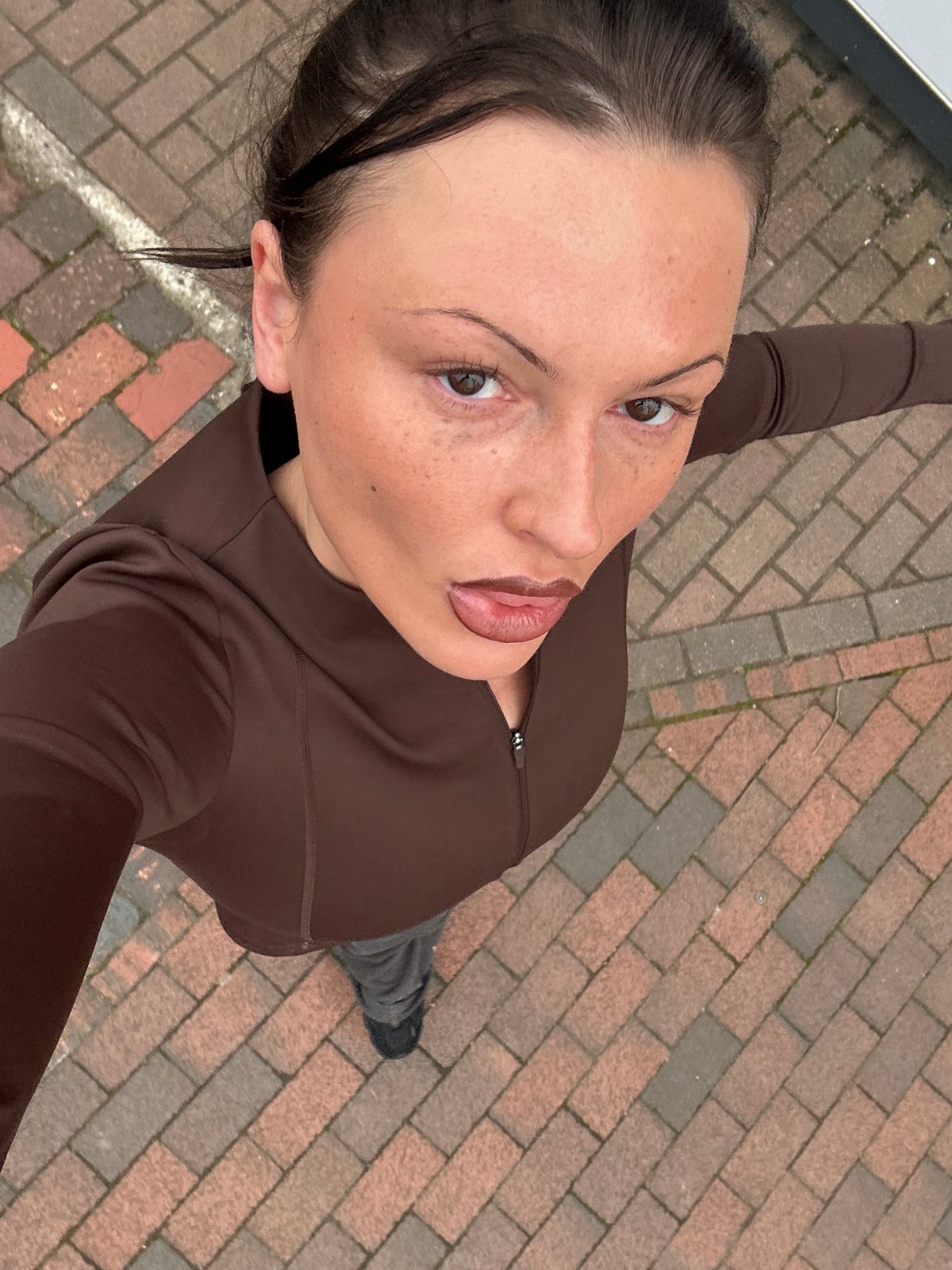 Person photographed on brick walkway in Tunbridge Wells