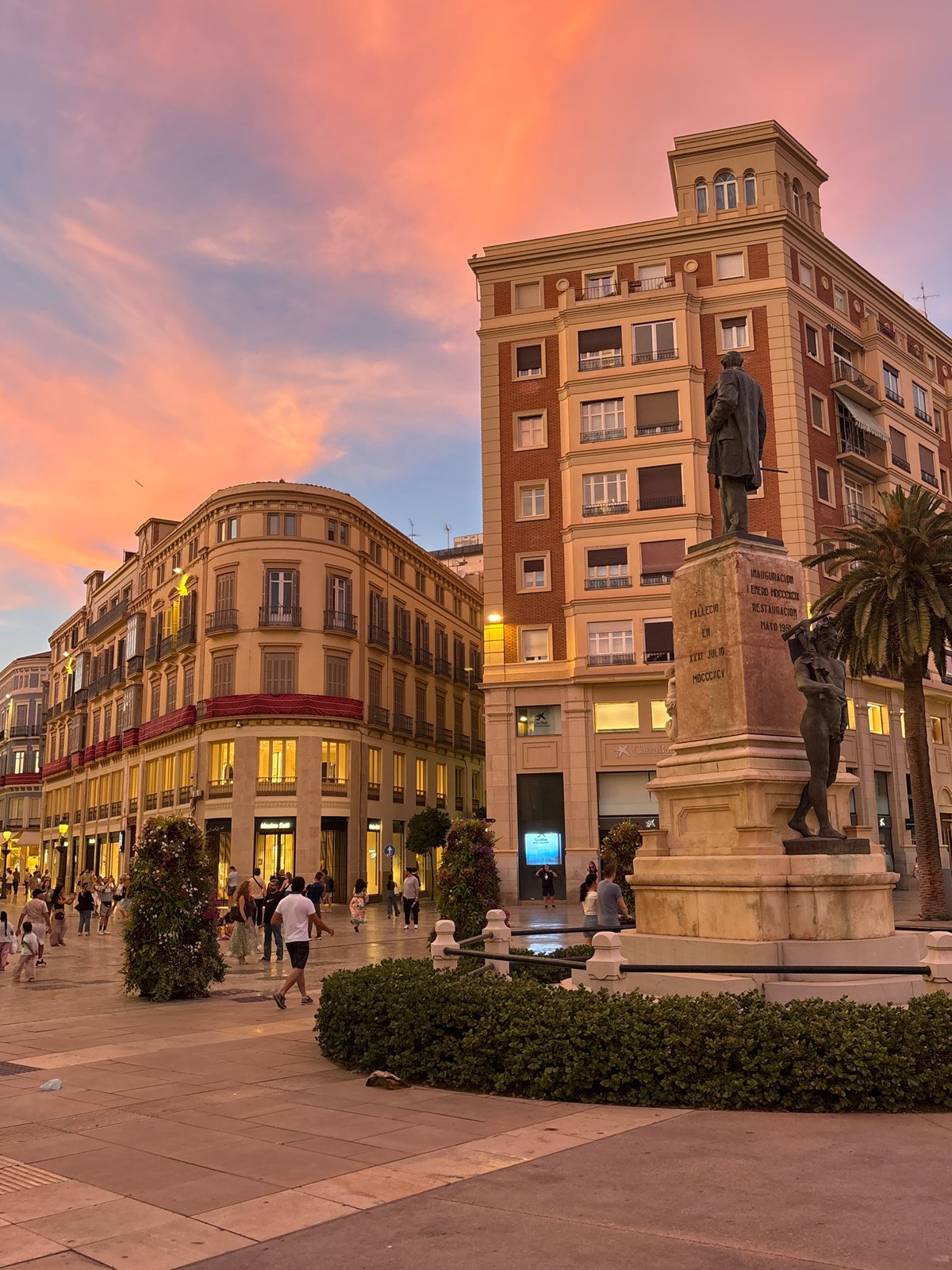 Dusk twilight scene captured in Málaga street plaza