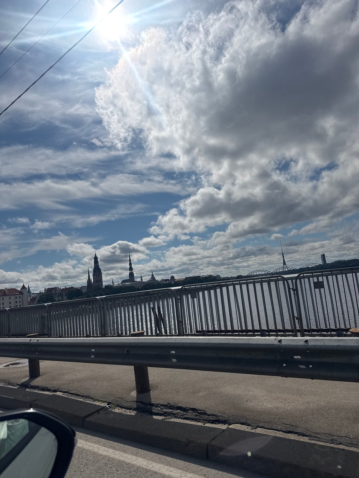 Sunny morning drive through Riga, hitting the waterfront and Spīķeru district