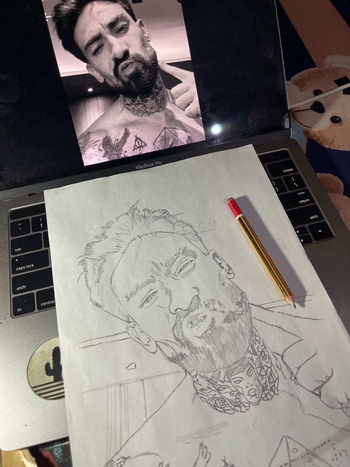 Artist creates detailed pencil portrait in Jos workspace