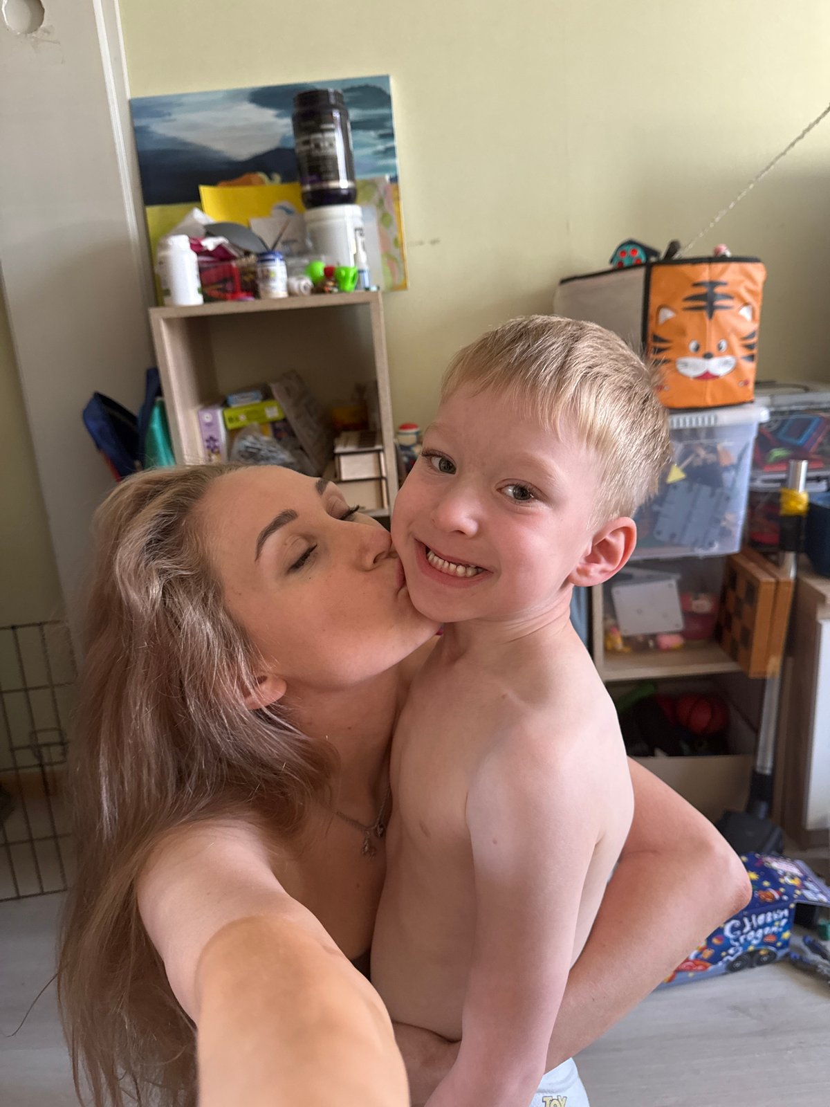 Mother and child share intimate moments during early morning