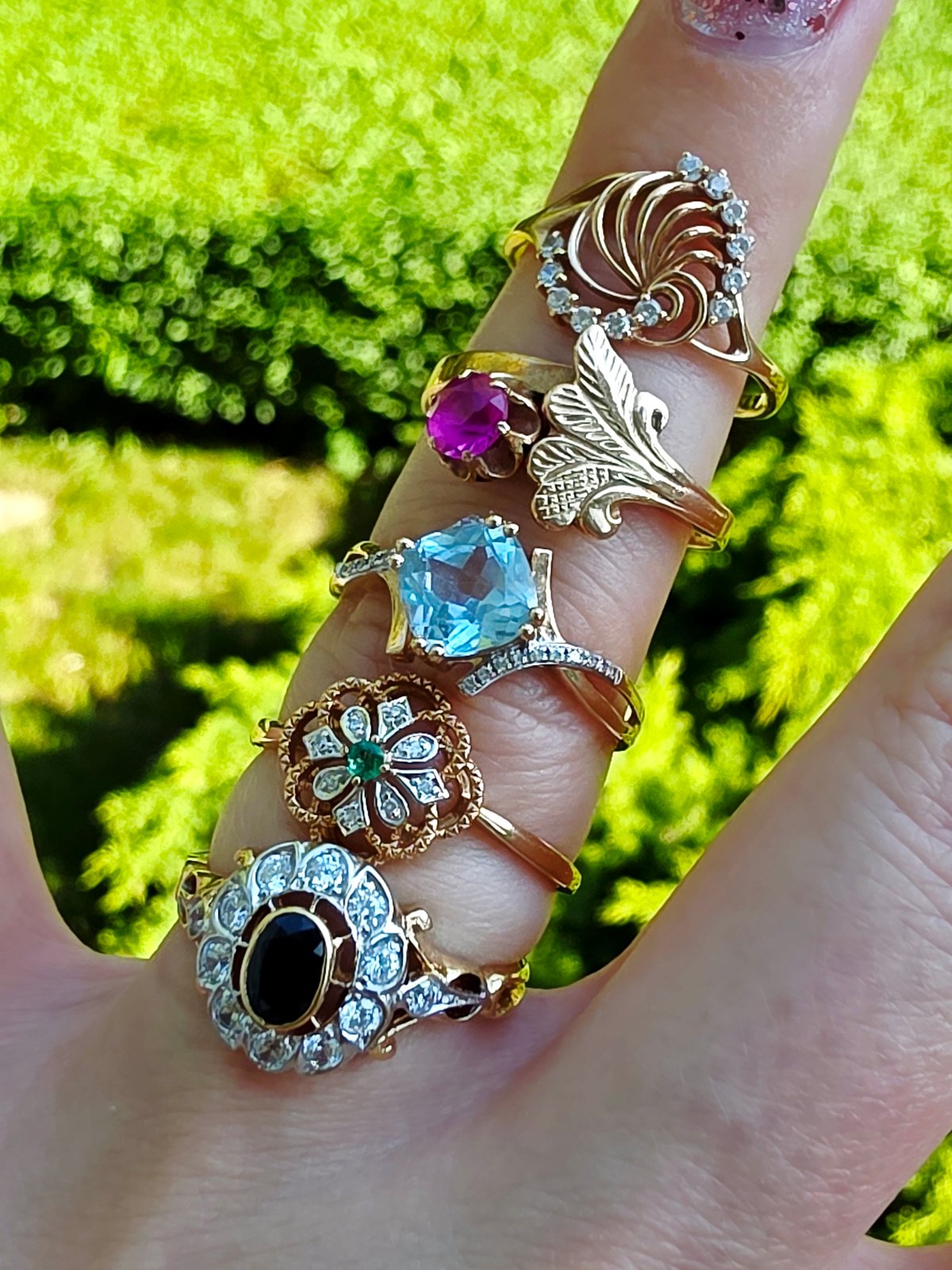 Rings and Chanel perfume styled across a short shoot