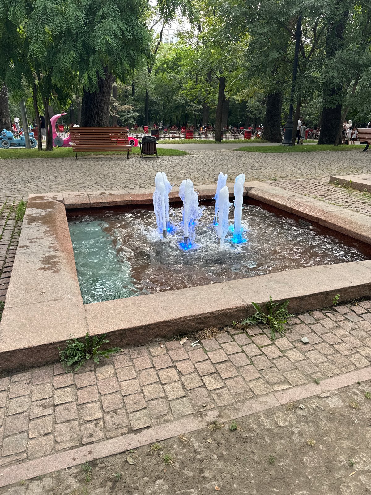 Almaty park afternoon: fountains, go-karts, treehouses, and trails