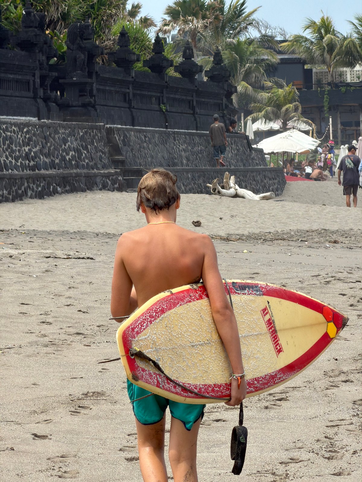 Early morning surf and café scene along North Kuta beach