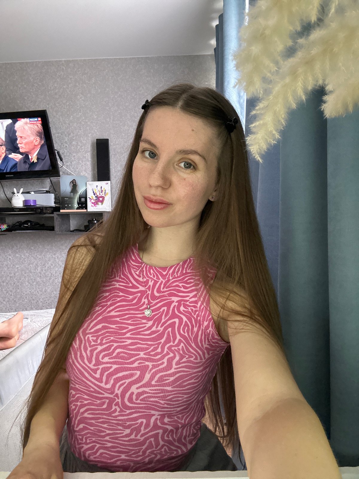 Woman documents morning beauty routine with toddler in Klin
