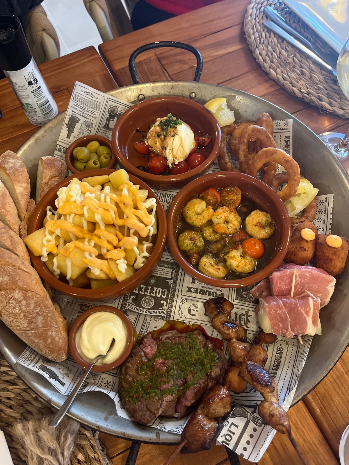 Tapas platter documented at Spanish coastal restaurant