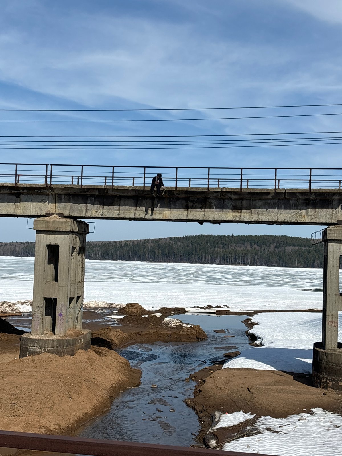Two figures spotted on abandoned bridge in Chaikovsky