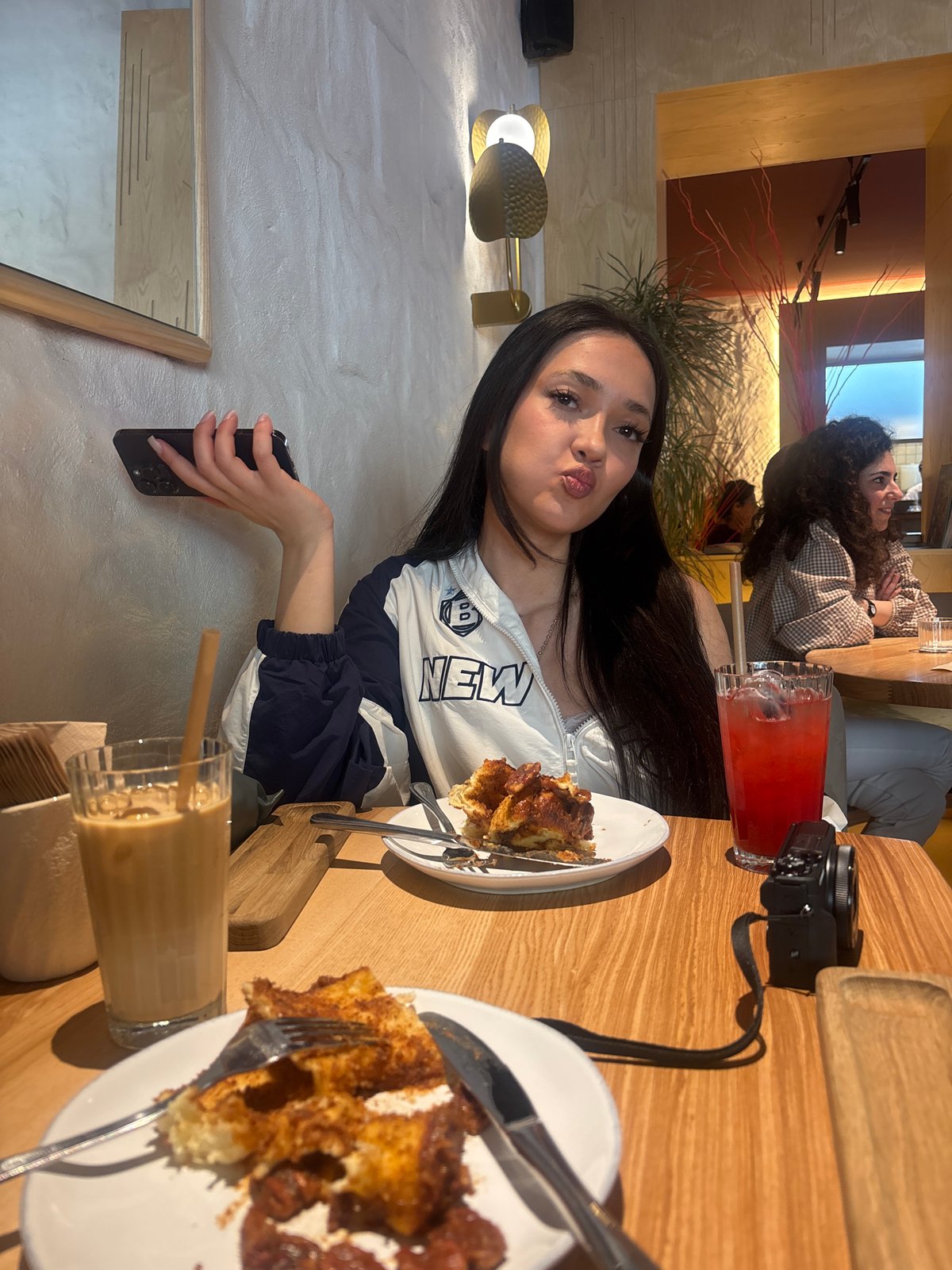 Woman documents leisurely breakfast outing at Yerevan cafe