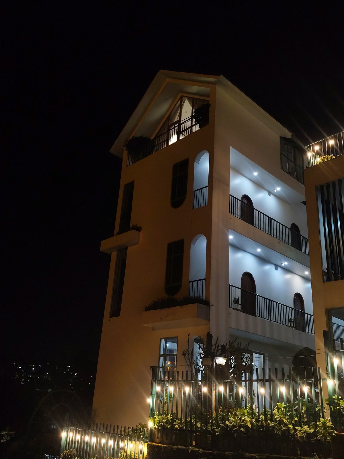 Da Lat hillside buildings and hotels lit up at night