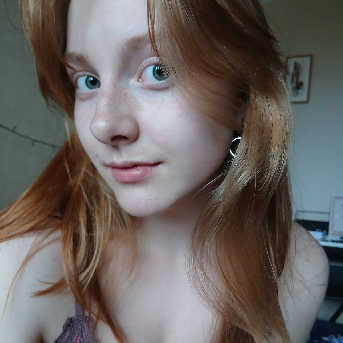 Portrait photograph captured in Yekaterinburg shows freckled young person