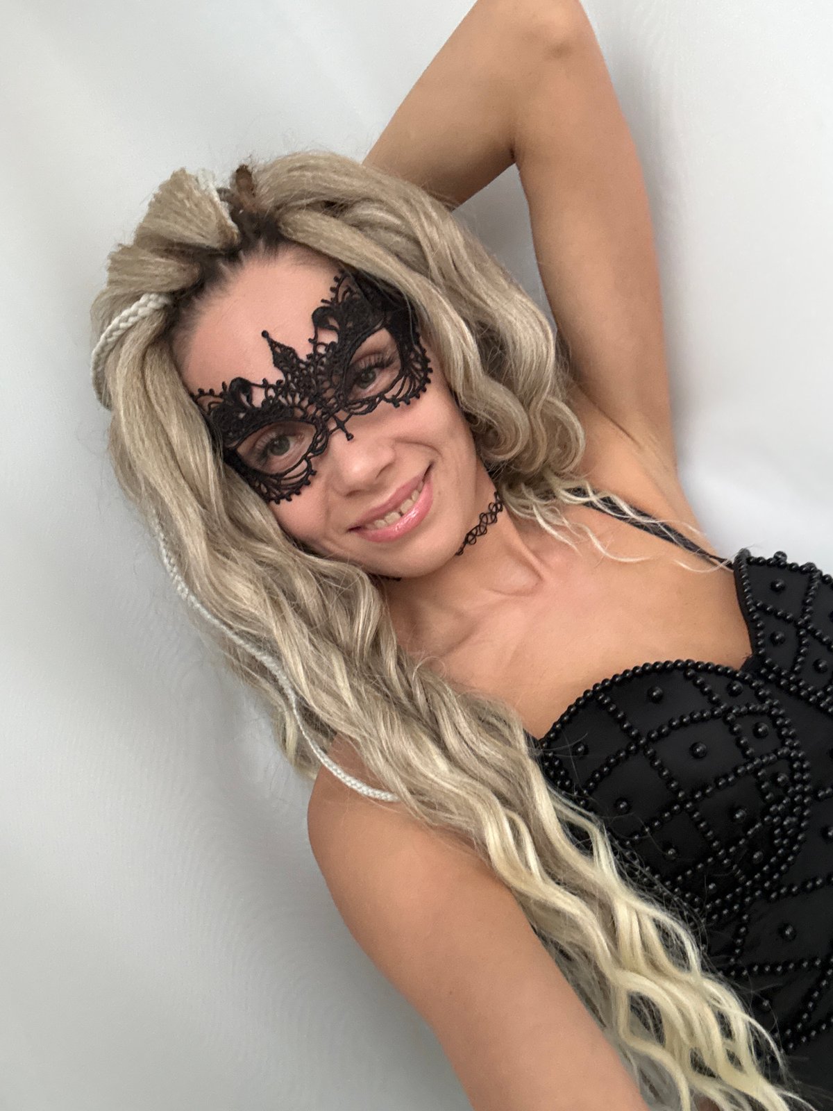 Masked woman in decorative attire observed in Rusanovo
