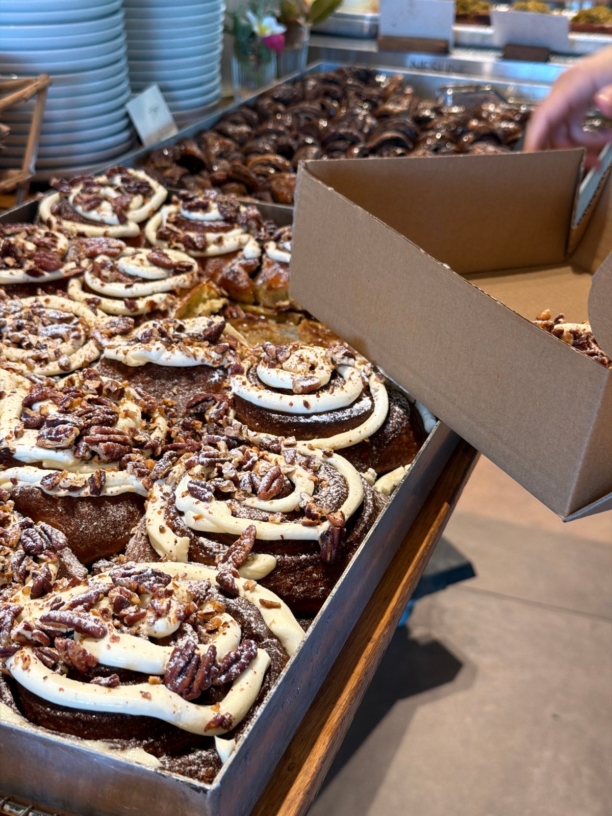 Fresh pastries and a banana plant in Kfar Monash
