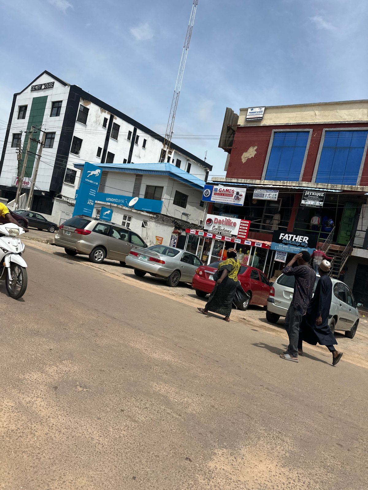 Street life and commerce across Jos on a busy morning