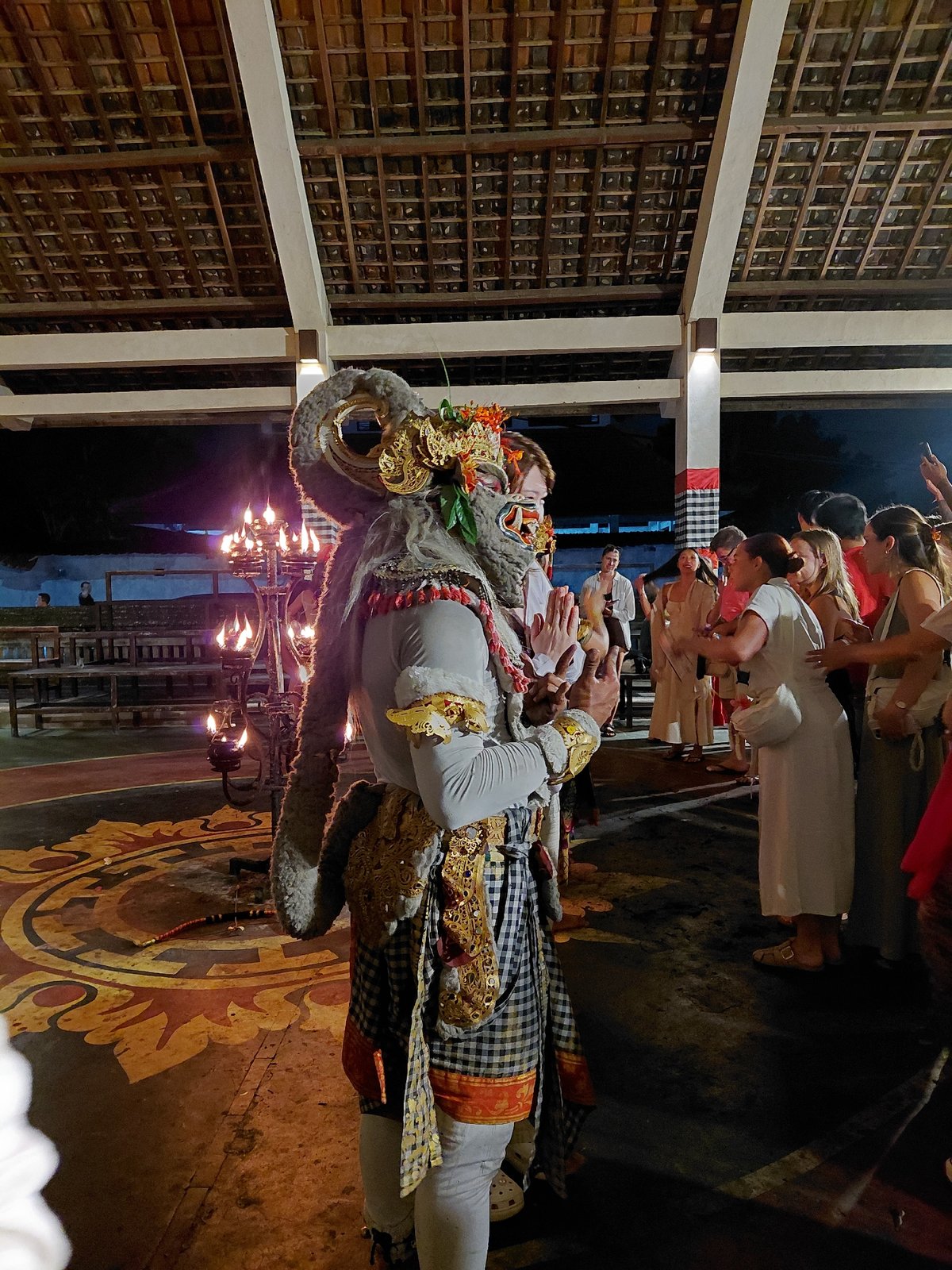 Candlelit Balinese performance with masked dancers in Ubud