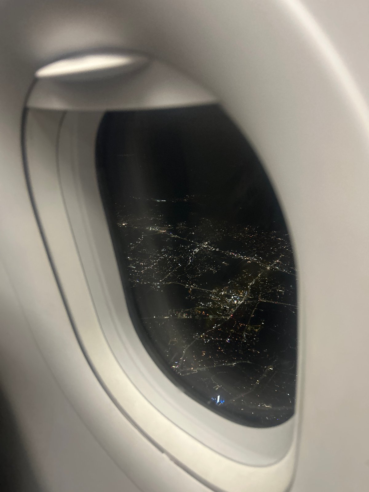 Nighttime aerial view of Sofia captured from airplane window