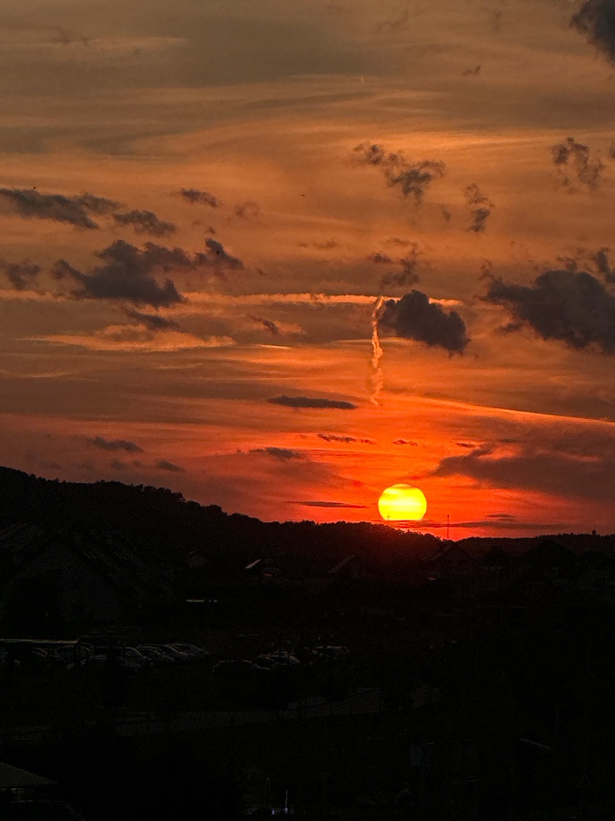 Vivid summer sunset over a Świebodzice residential street