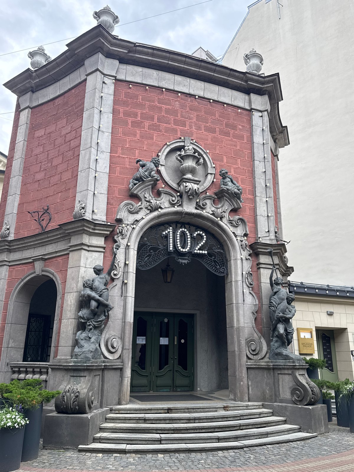 Historic brick building and garden café on Elizabetes iela, Riga