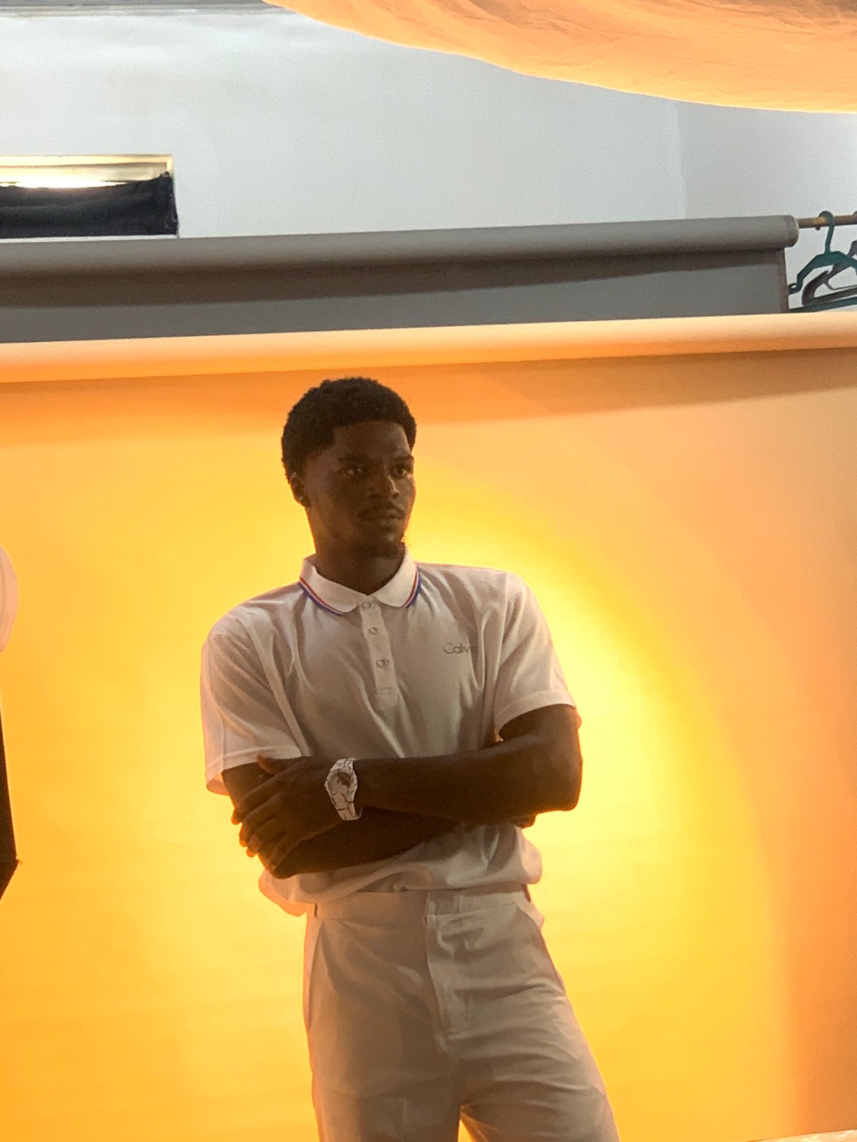 Portrait photography session captures man in white, Gura Top