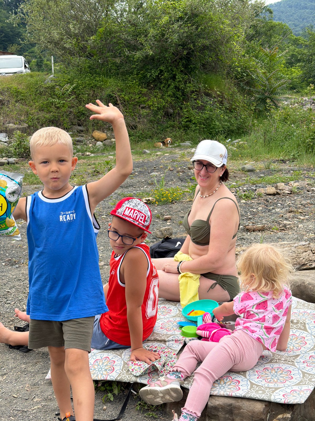 Family enjoys riverside picnic gathering in Plastunka Russia