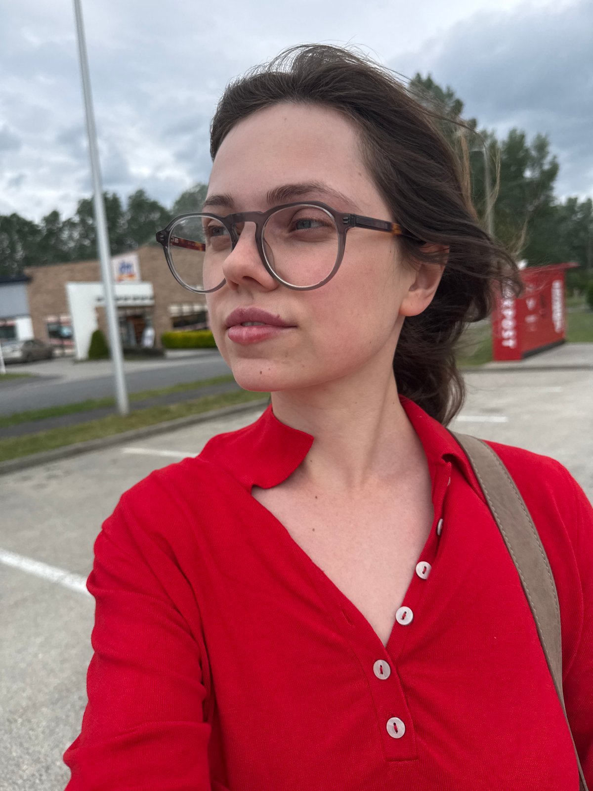 Woman's afternoon shopping trip documented in Balatonlelle, Hungary