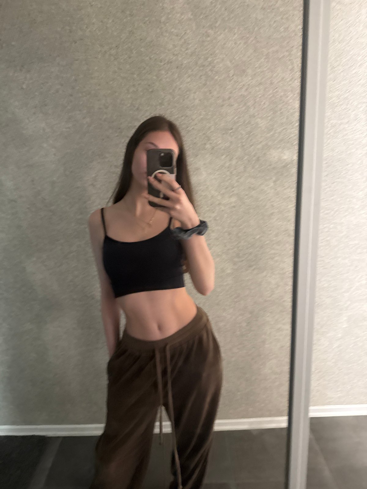 Woman takes mirror selfie in Sofia apartment