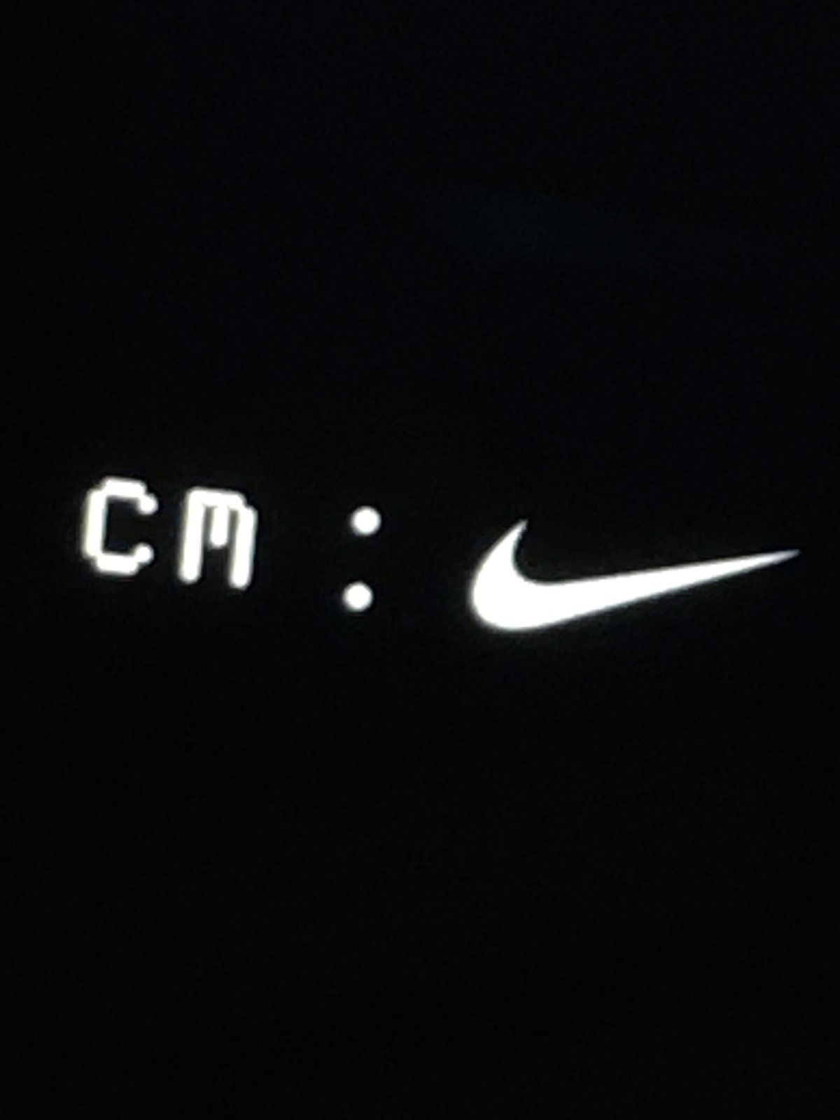 Nike logo with vertical dots, 'CE' letters spotted in Erba