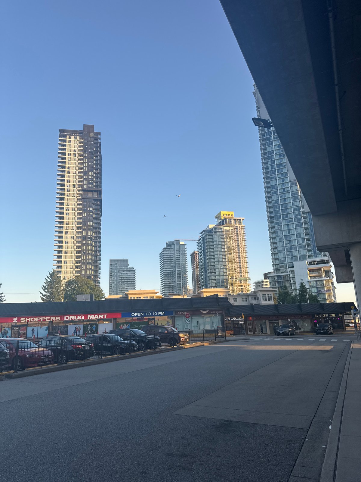 Street-level look at Burquitlam Station and its urban surroundings