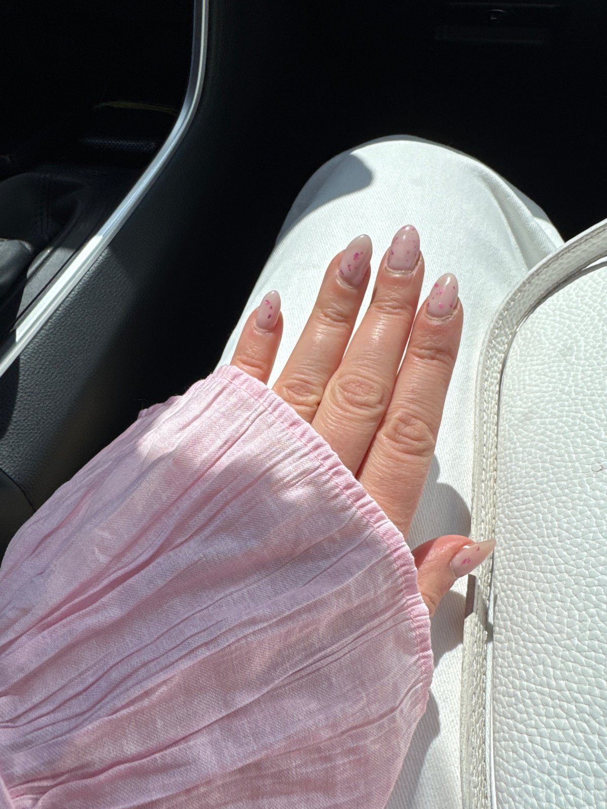 Woman in pink shirt observed in car in Sofia