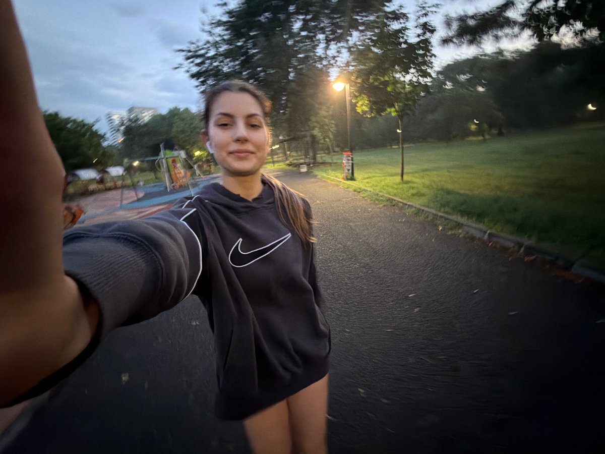 Woman takes evening selfie in Burgas park