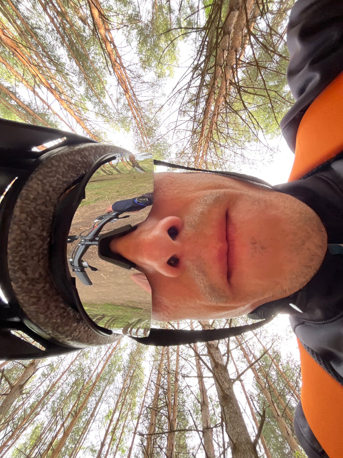 Cyclist photographed in pine forest near Chaikovsky, Russia