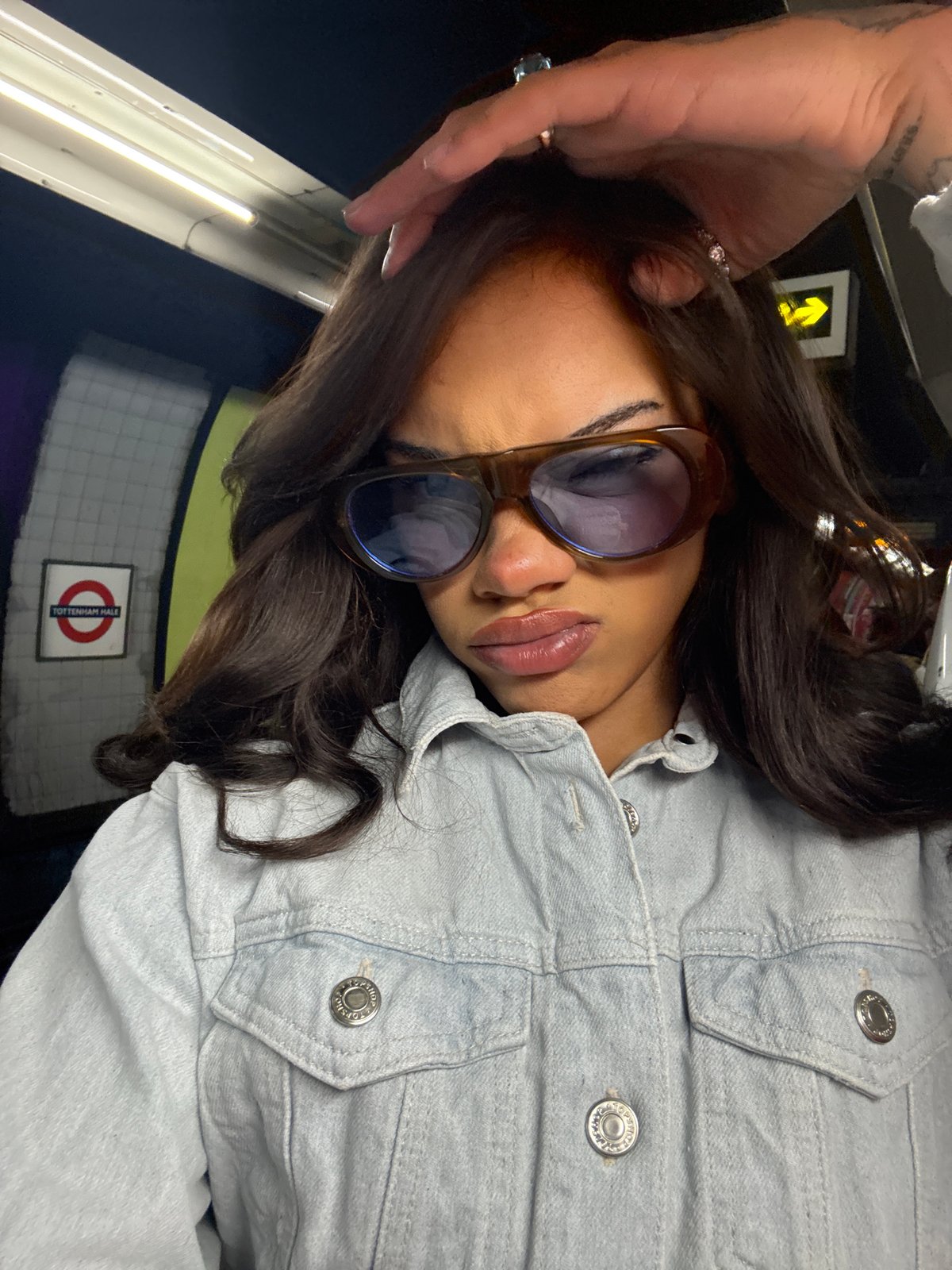 Woman in denim jacket spotted on London Underground near Tottenham Hale