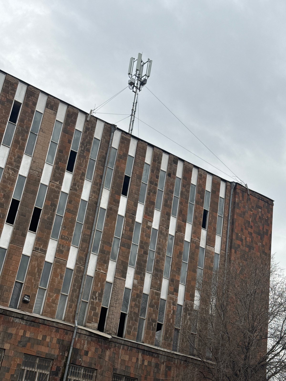 Urban scenes documented across Yerevan on overcast afternoon