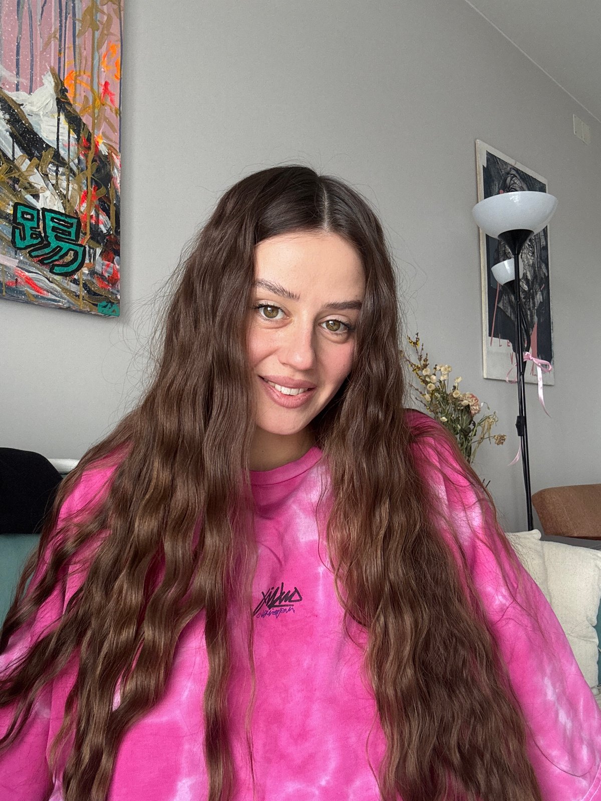 Woman documents morning craft session in Krasnoyarsk apartment