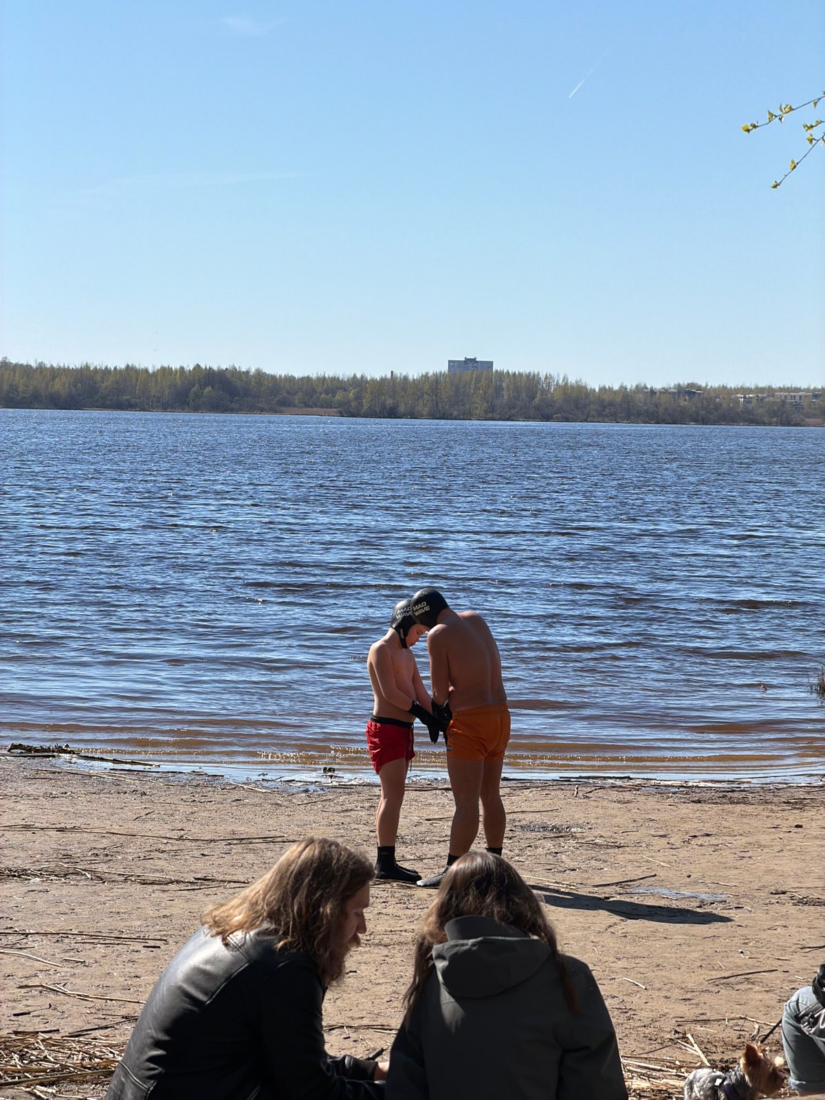 Swimmers enjoy sunny beach day in Saint Petersburg
