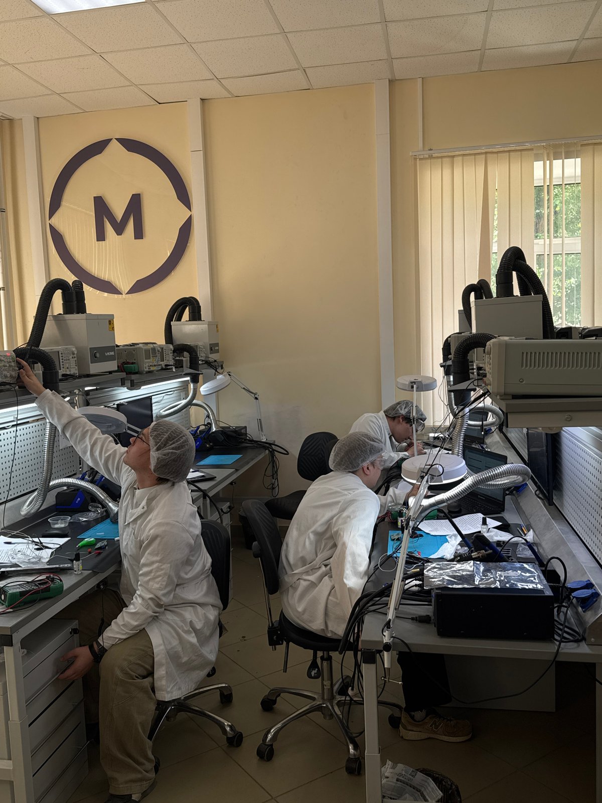 Laboratory workers conduct electronics research in Perm facility