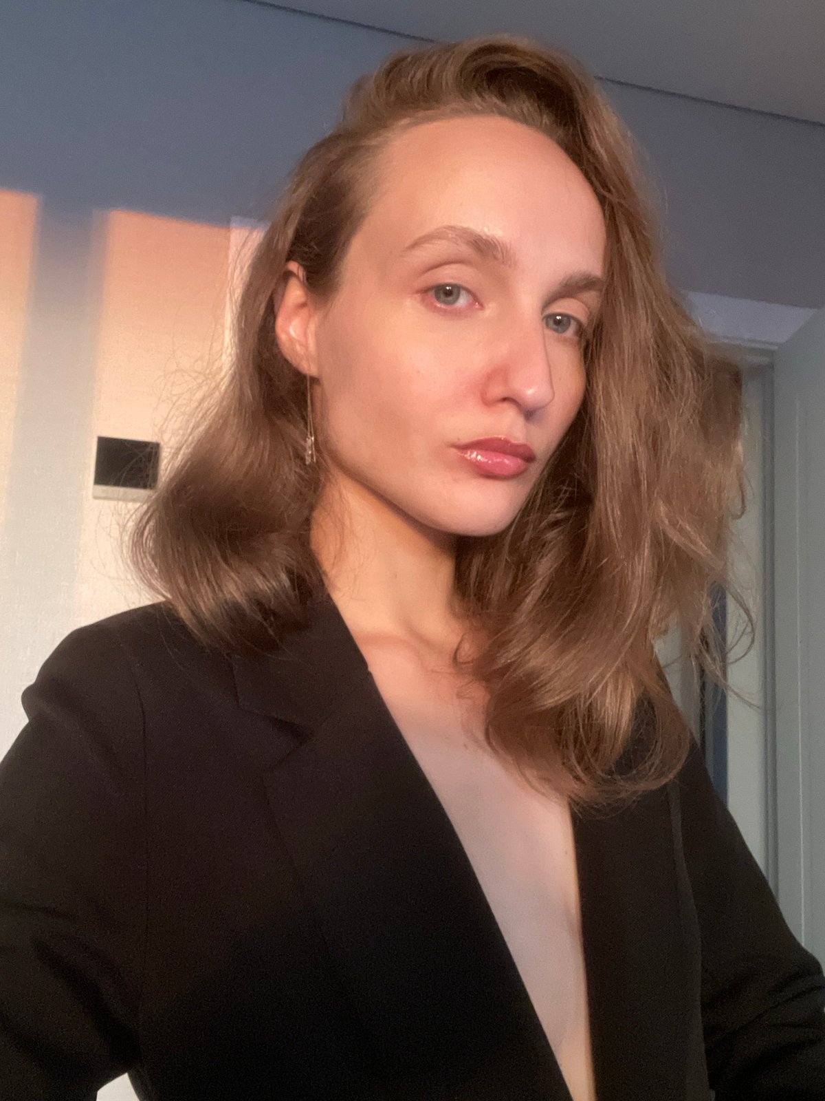 Woman in black blazer photographed in Подшивалово, Russia