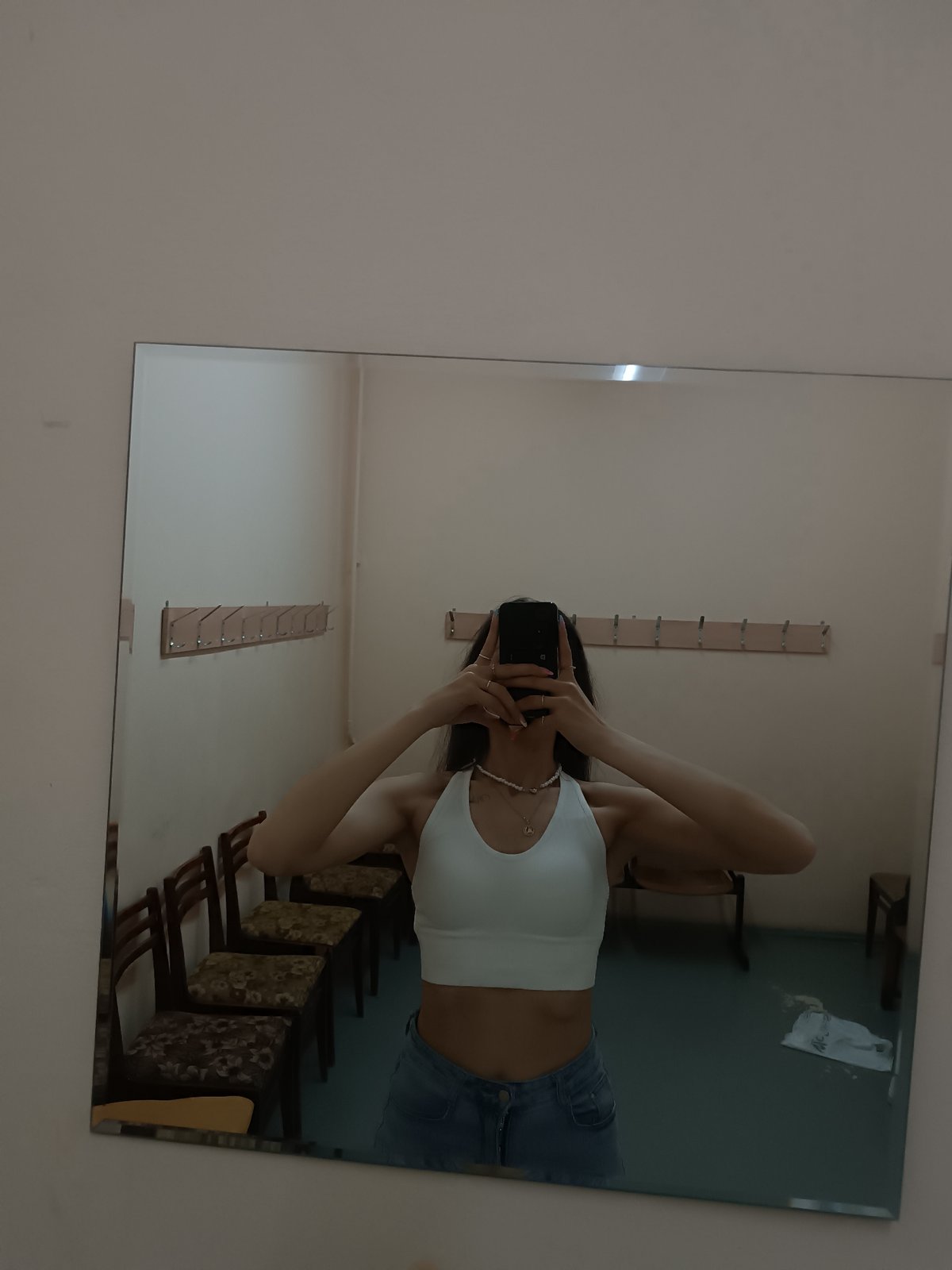 Woman Takes Series of Mirror Selfies in Dressing Room