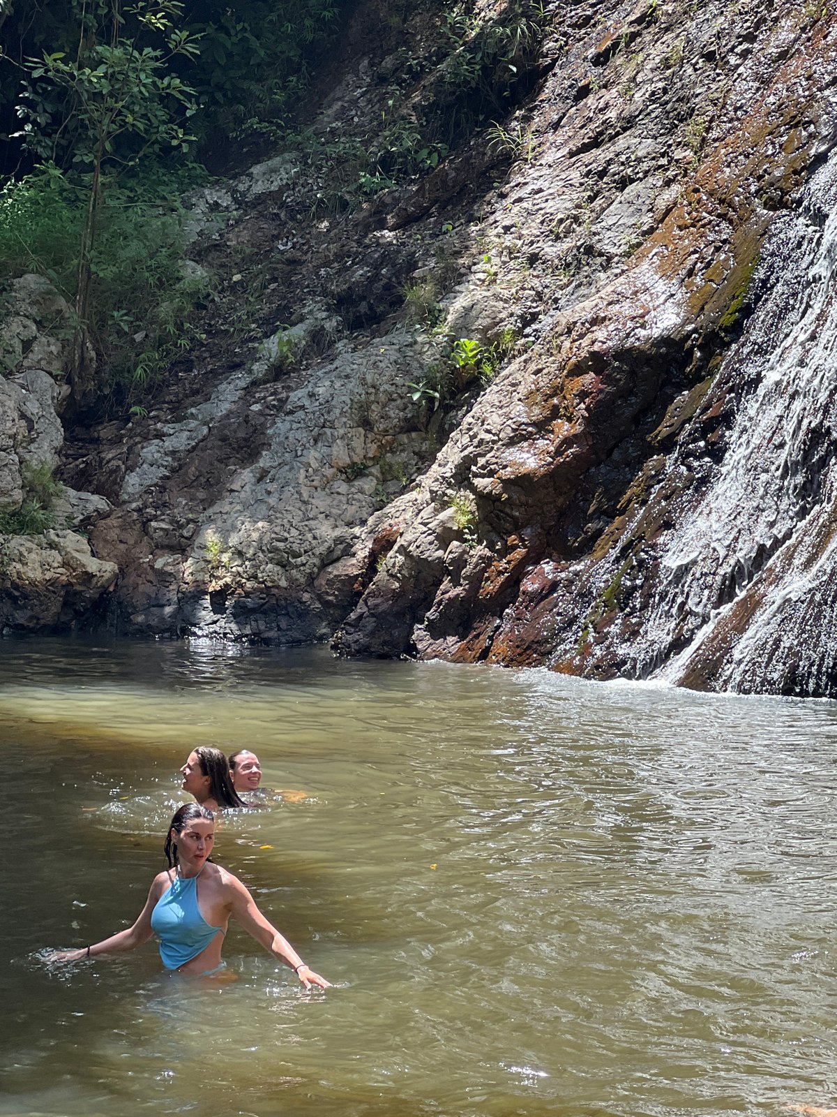 Morning visitors enjoy natural waterfall swimming in Baan Thurian