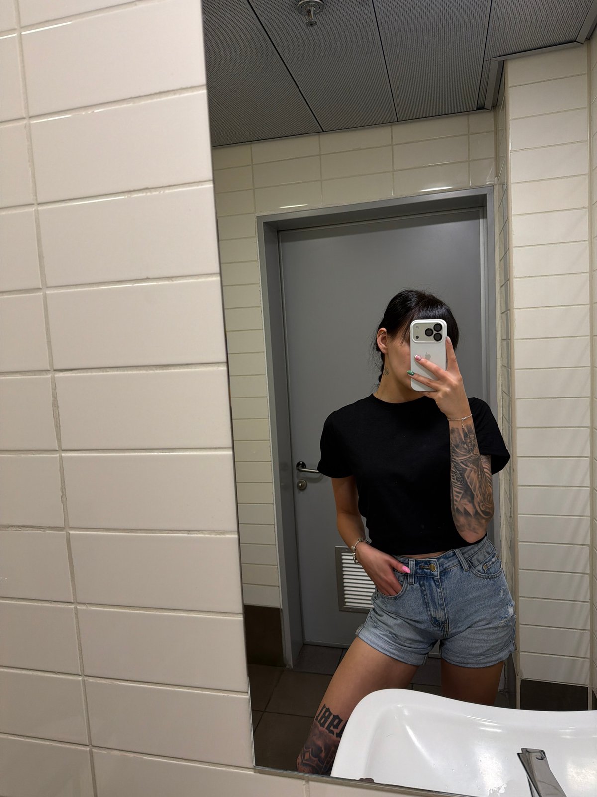 Mirror selfie taken in Plovdiv public restroom