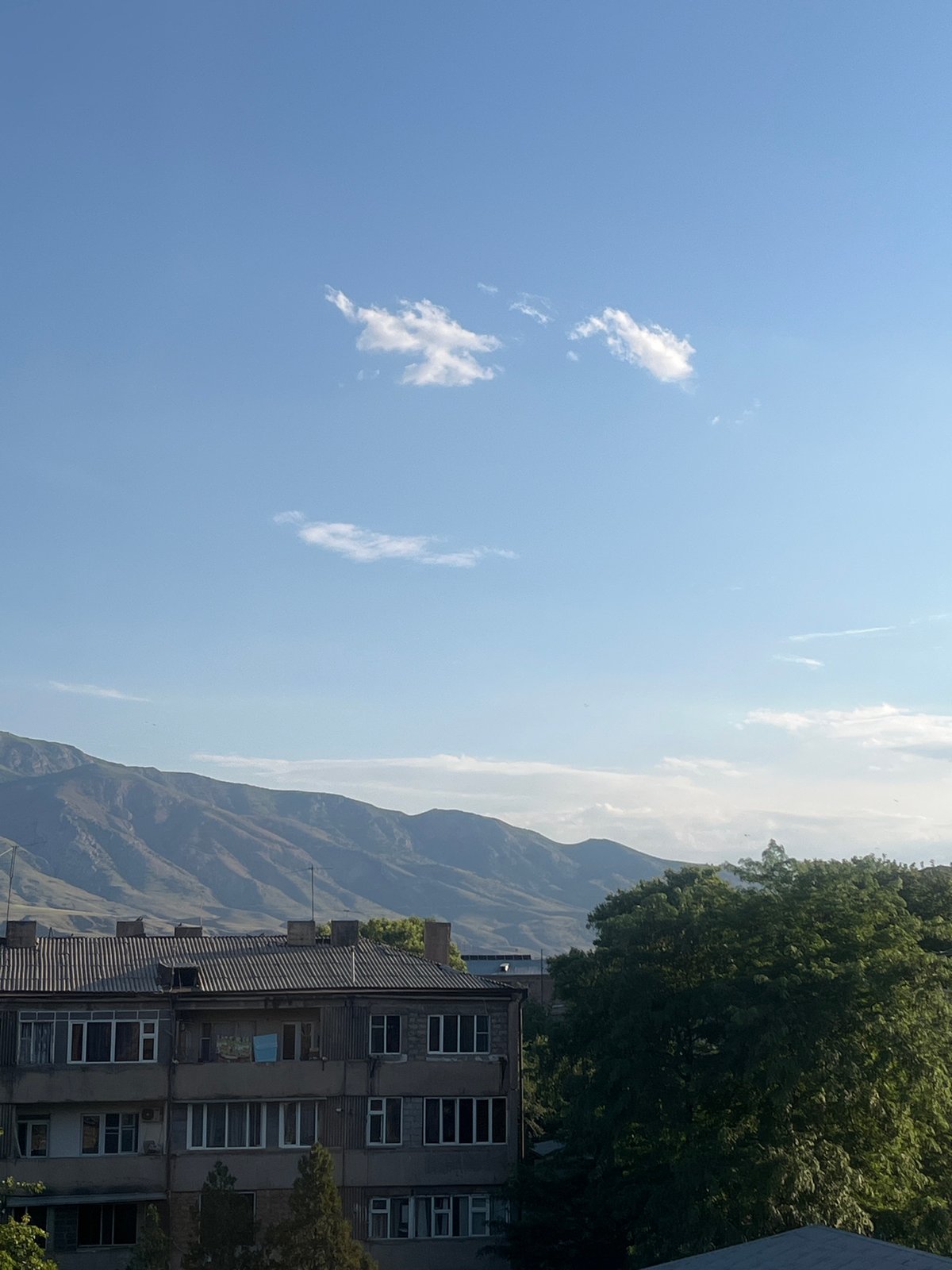 Sunny afternoon rooftop views across Gladzor, Armenia