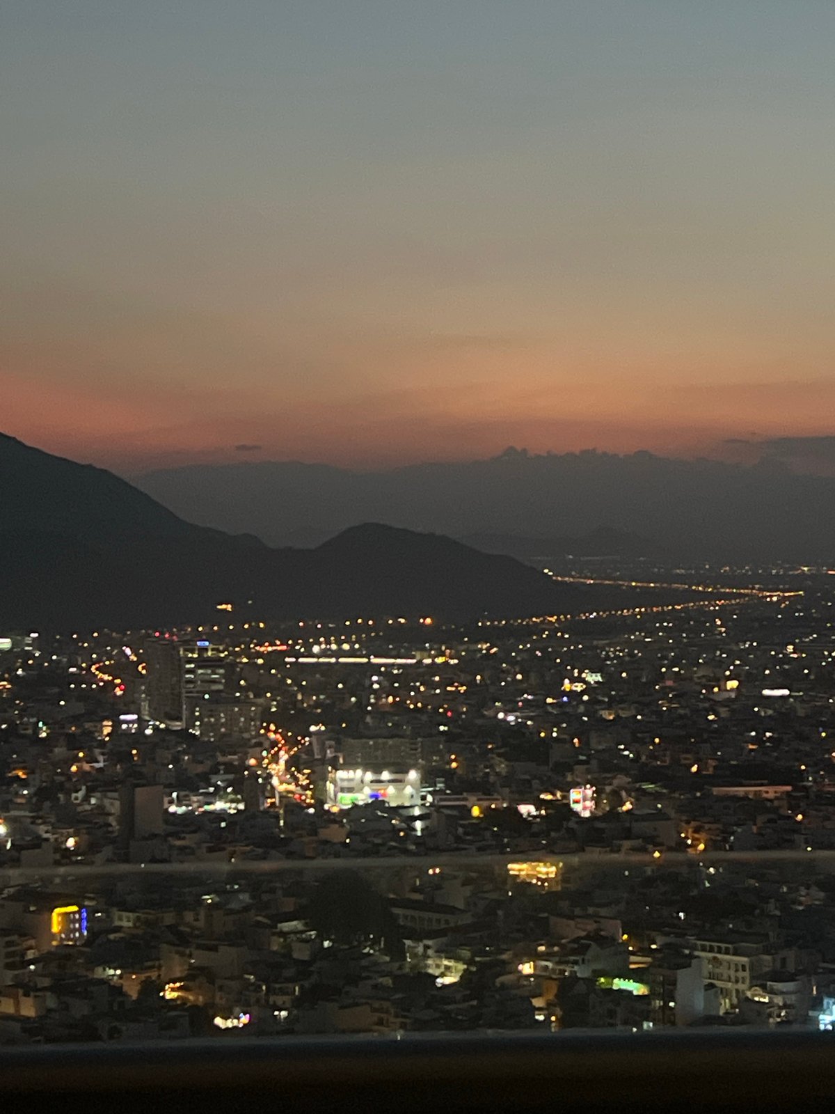 City nights from above, plus a quiet cafe moment